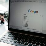 pexels-photo-16368540-16368540 A close-up shot of a laptop displaying a Google search page with related searches visible.